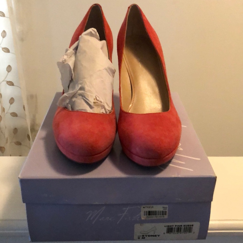 Peach suede pumps